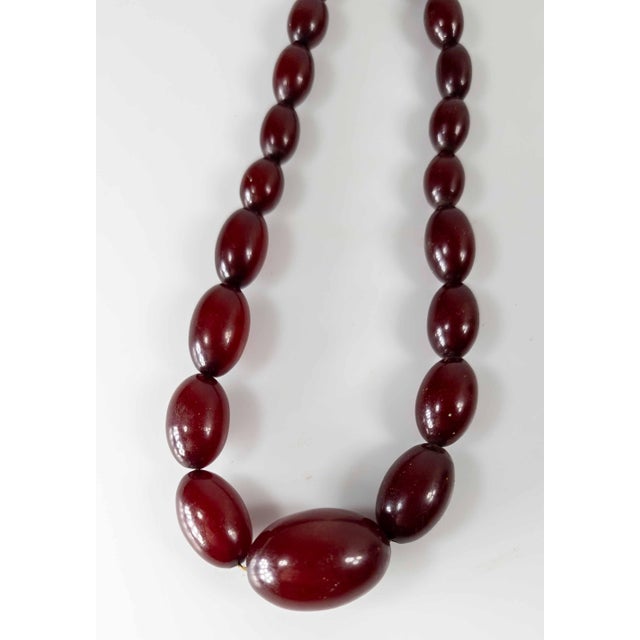 Plastic 20th Century Art Deco Cherry Amber Bakelite Graduated Bead Necklace For Sale - Image 7 of 11