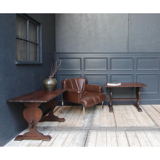 This set of 2 small original side tables comes from a monastery in Switzerland. They were made of solid oak around 1900.