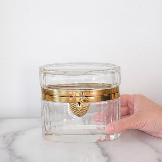 French Baccarat oval cut crystal faceted box, in good overall condition. There are some scratches along the bottom (which...
