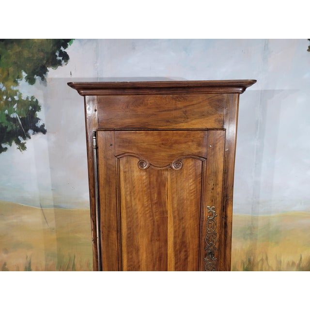 Small louis xv style walnut cabinet – 18th/19th century an elegant, small antique walnut cabinet, narrow and vertical in...