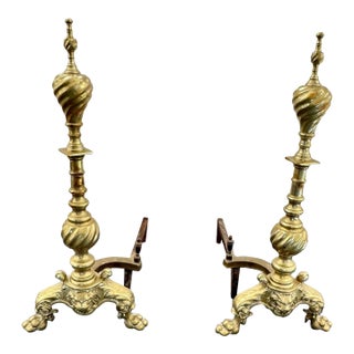 Pair of Antique Early 20th Century Empire Brass Cast Iron Andirond With Lion Face on Base, Spiral Twist Paw Feet For Sale