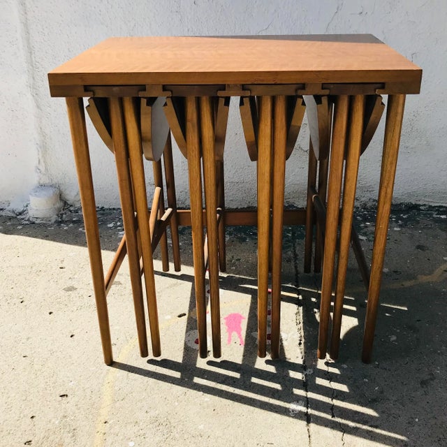 Rare find! Possibly my favorite set of nesting tables within the MCM design universe. This is an original set of Bertha...
