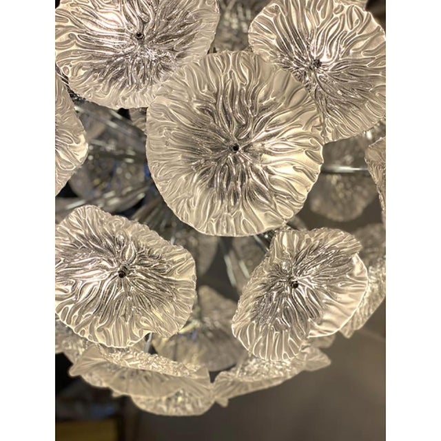 Lively and luxury flowers in clear and sanded Murano glass. Exclusive design by Simoeng. a luxury piece of italian art....