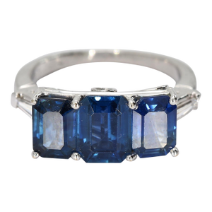 Late 20th Century Platinum Three Stone Ring With Blue Emerald Cut Sapphire & Diamonds - Size 5.75