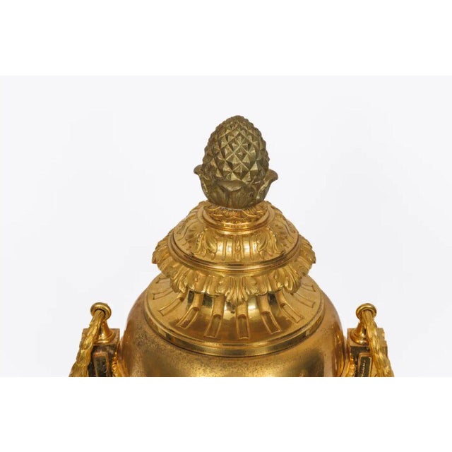A Magnificent Pair of French Louis XVI Style Ormolu Vases A superb pair of French Louis XVI style ormolu vases,...