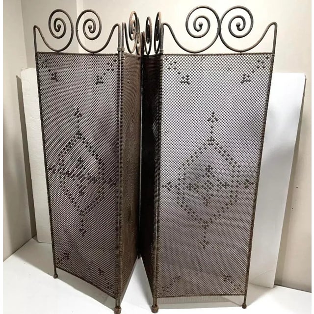This antique fireplace screen is a stunning piece in the style of Native American Mission Arts and Crafts. The folding...