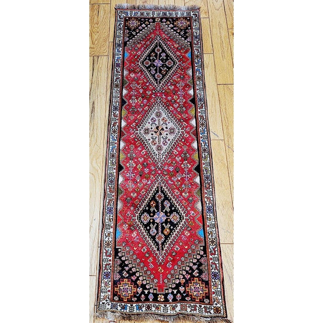 "Beautiful vintage Qashqai tribal Gabbeh runner circa the mid 1900s. The Gabbeh runner shows the Qashqai traditional...