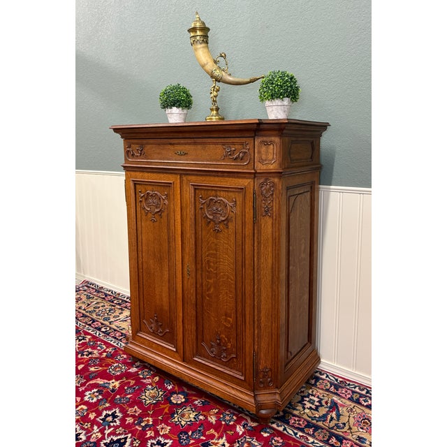 ELEGANTLY Carved Antique French Honey Oak Cabinet with Double Doors and Drawer~~c. early 20th century Beautiful, canted...