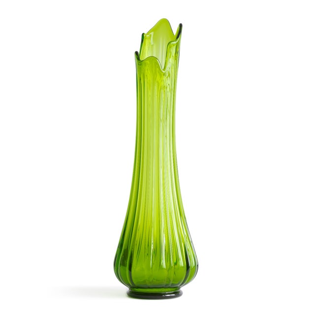 This refined photographic print features a 1960s L.E. Smith swung vase, celebrated for its tall, fluid form and vibrant...