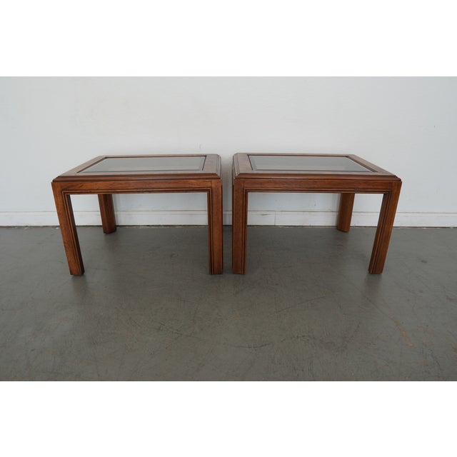 Vintage Drexel Heritage glass-top end tables from the Accolade Collection, produced in the early 1980s. Features a smoked...