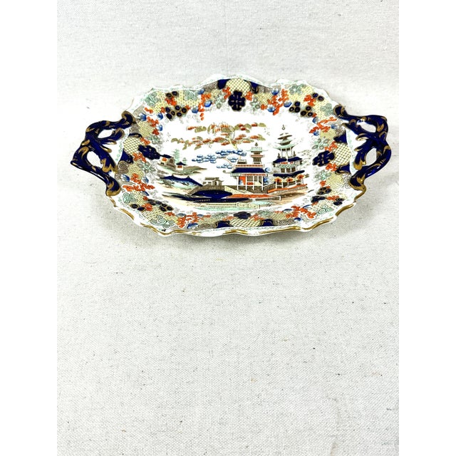 Vintage Asian platter with handles. This is a pre-owned item so please see all pictures and ask any questions.