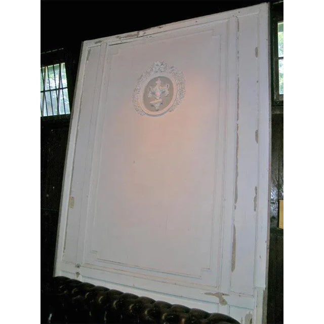 Large painted curved boisere panel. Consisting of rectilinear mouldings and a circular medallion.
