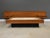 A mid century modern teak queen size floating platform bed with floating nightstands and black finger pulls. Made in...