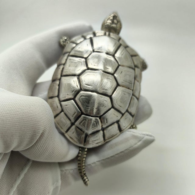 A striking vintage Italian collectible, this large turtle-shaped box is handmade in genuine silver (800/000) during the...