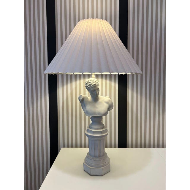 Strikingly handsome form Roman male bust on fluted column sitting on Doric style base, all made of plaster. Pure white in...