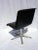 Chair with black full-grain leather seat on central leg. High stability, 5-branch base. Seat does not swivel. Weight 10...
