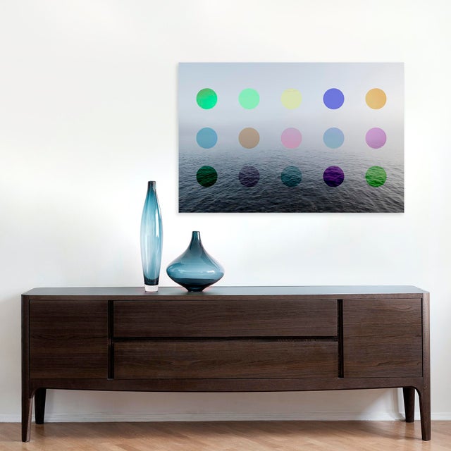 Cameron's unique seascape fine art is more modern with colourful dots added with symmetry. The vintage hues add a warth...