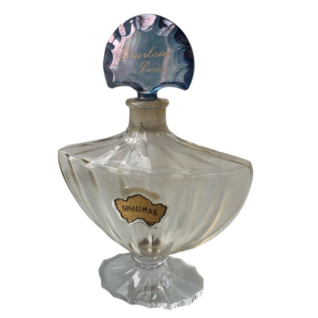 The iconic Shalimar perfume bottle, designed by Raymond Guerlain in 1925, won first prize at the Paris Decorative Arts...