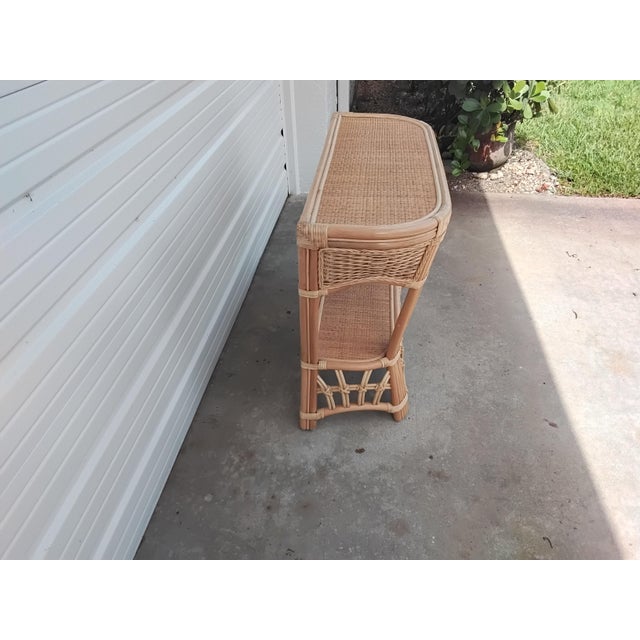 Love the size of this piece, can go anywhere. It's a great coastal or tropical look for any room. The light blonde finish...