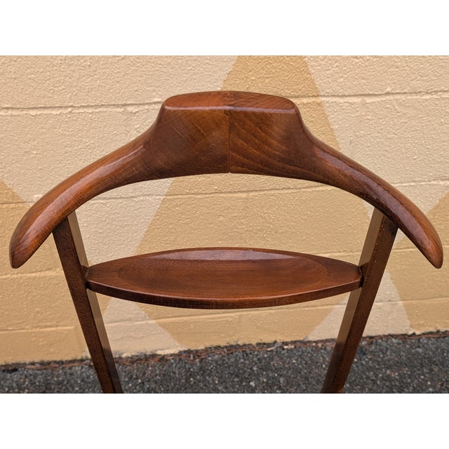 Add a touch of refined European luxury to your interior with this authentic Vintage 1970s Italian Wood Valet Stand, a...