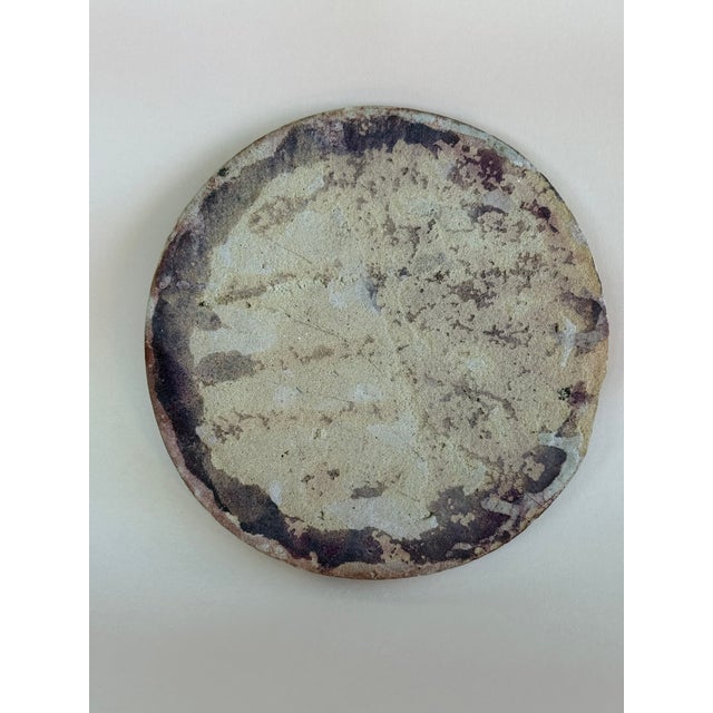 Antique Persian tile. Description: Blue & white design with black accents. The central motif is that of a fawn surrounded...