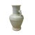 This is a handmade ceramic pottery vase with a round fat shape body design and underlay floral pattern. The surface is...