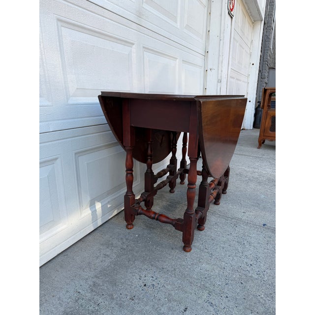 Vintage Jacobean Style Mahogany Gateleg Drop-Leaf Dining Table With Turned Stretcher Base For Sale - Image 4 of 12