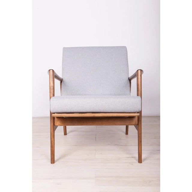 The armchair was produced by the Polish company Swarzędzka Furniture Factory in 60 s. The armchair have been reupholstered...