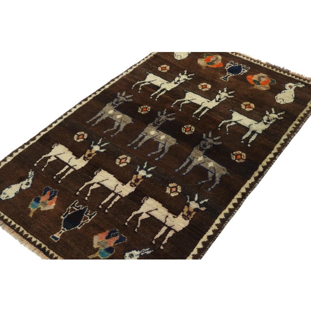 This vintage 3x5 Gabbeh Persian rug is from the latest entries in Rug & Kilim’s rare tribal curations. Hand-knotted in...