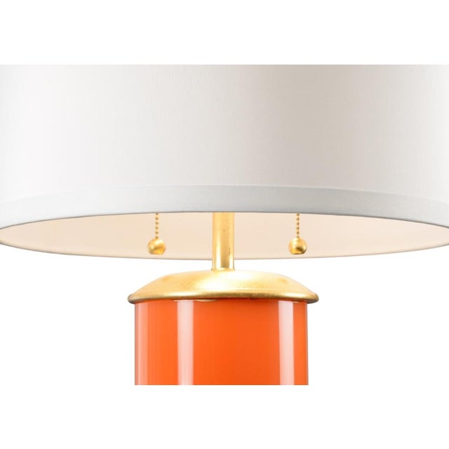 Brighten your home with this charming transitional table lamp. Savannah features a colorful glass cylinder with a dazzling...