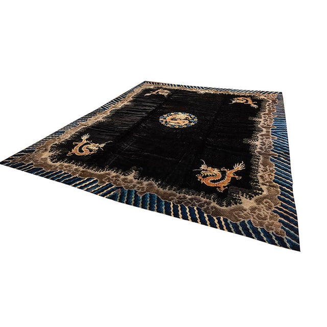 This is an antique pecking Chinese rug woven in during the beginning of the 20th century circa 1920s. it has an all-over...