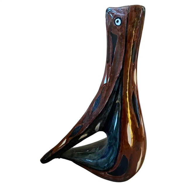 An abstract bird brown ceramic vase hand-crafted and painted by small producer Garofalo in Santo Stefano di Camastra,...