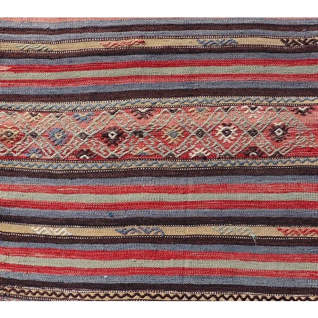 Textile Mid 20th Century Vintage Turkish Kilim With Horizontal Stripes and Tribal Motifs in Bright Tones For Sale - Image 7 of 12