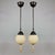 These Art Deco pendants were designed and manufactured in Germany in the 1930s. The lights feature a matching pair of...
