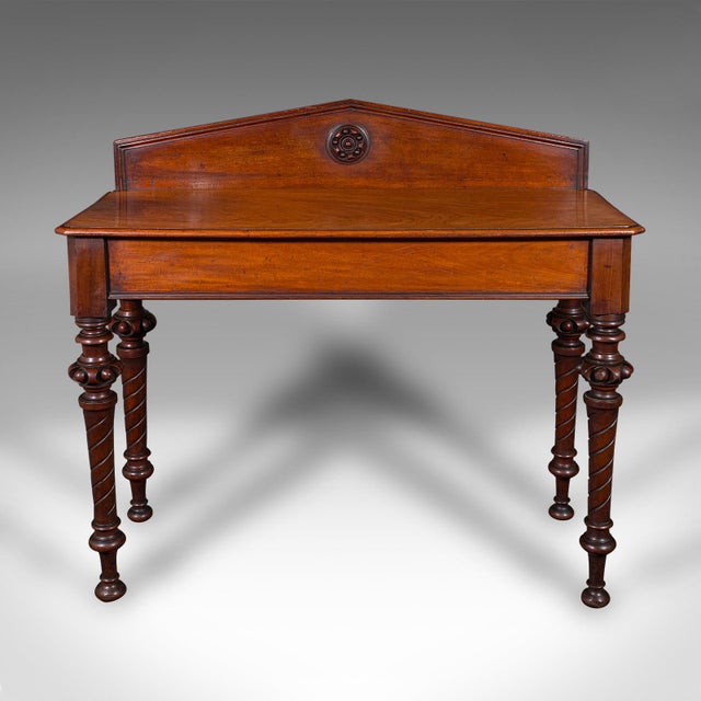 This is an antique hall table. A Scottish, mahogany console, side table or buffet server, dating to the William IV period,...