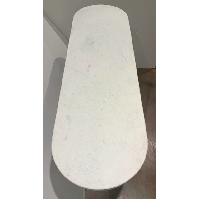 Stylish Arteriors Modern White Stone Hamish Console Table, hammered metal bronze finished base, white stone top with...