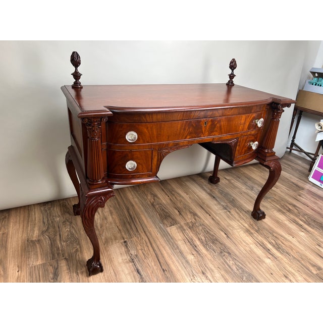 This Antique George IV Chippendale Flame Mahogany Buffet, dating to the mid-19th century, is a beautiful example of...