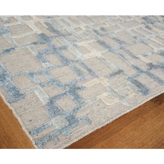 The Vista rug reimagines contemporary design with its dramatic high low patterns and exciting color palette. An allover...