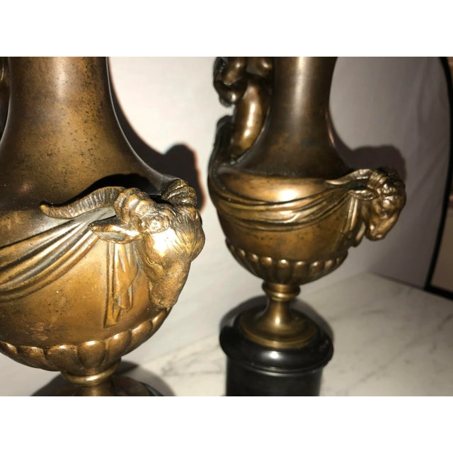 Burnt Umber 19th C. Urns on Marble Stands Bearing Cherubs & Rams Heads - a Pair For Sale - Image 8 of 13