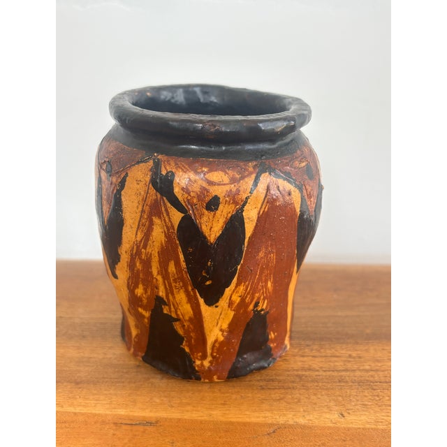 Charming brutalist black and brown pottery, perfect as pencil or toothbrush holder. Handmade and signed by the artisan....