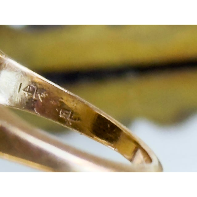 1960s 14K gold dome ring featuring a dramatic bombe silhouette with celestial-inspired detailing. The sculptural yellow...