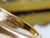 1960s 14K gold dome ring featuring a dramatic bombe silhouette with celestial-inspired detailing. The sculptural yellow...