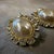 Pierre Cardin 1980s Gilted Metal Rhinestones and Faux Pearls Italian Ribbon Clip-on Earrings For Sale - Image 4 of 10