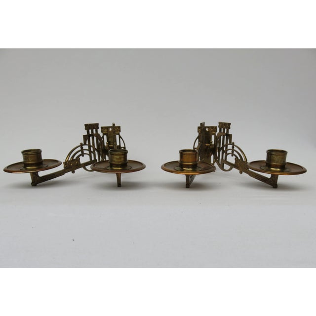 1 pair of candlesticks piano for 2 candles from the time of early Modernism in a more strict form language of bronze. both...