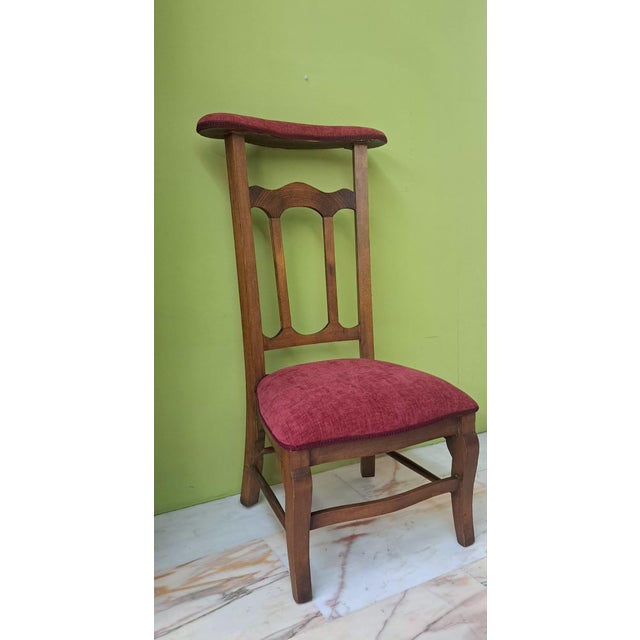 Antique prie-dieu (also known as a prayer chair), a religious piece of furniture designed specifically for individual...