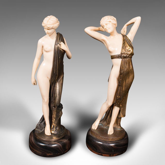 Our Stock # 24738 This is a pair of vintage Art Deco figures. A German, cellulose and gilt metal decorative statuette,...