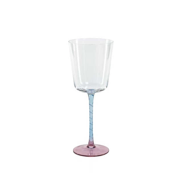 This set includes four wine glasses, specially designed for red wine enthusiasts. The glasses' unique shape and design are...