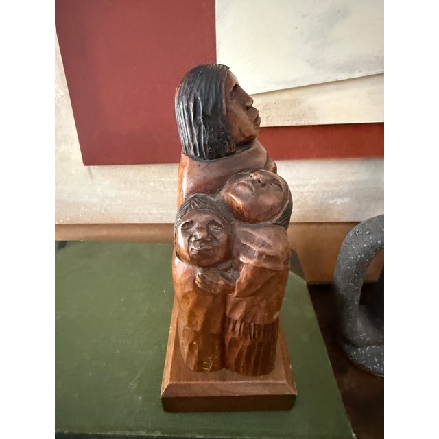 This mid-century modern wood sculpture is a hand-carved work by the Bolivian artist Guillermo Arias, also known as Flores...