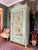 Stunning antique painted armoire, we have added gorgeous chinoiserie to the door panel with an aged patina. The wardrobe...