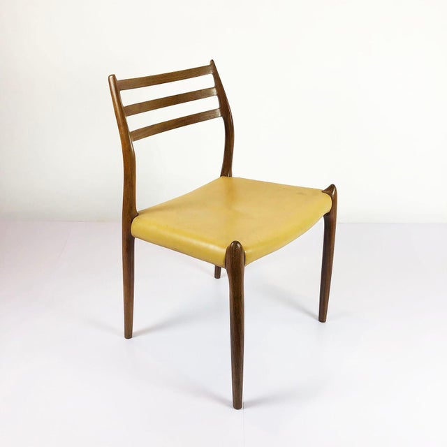 Circa 1970. We offer this Vintage J.L. Moller Model 78 Chair. The chair are made of solid teak wood, which is known for...